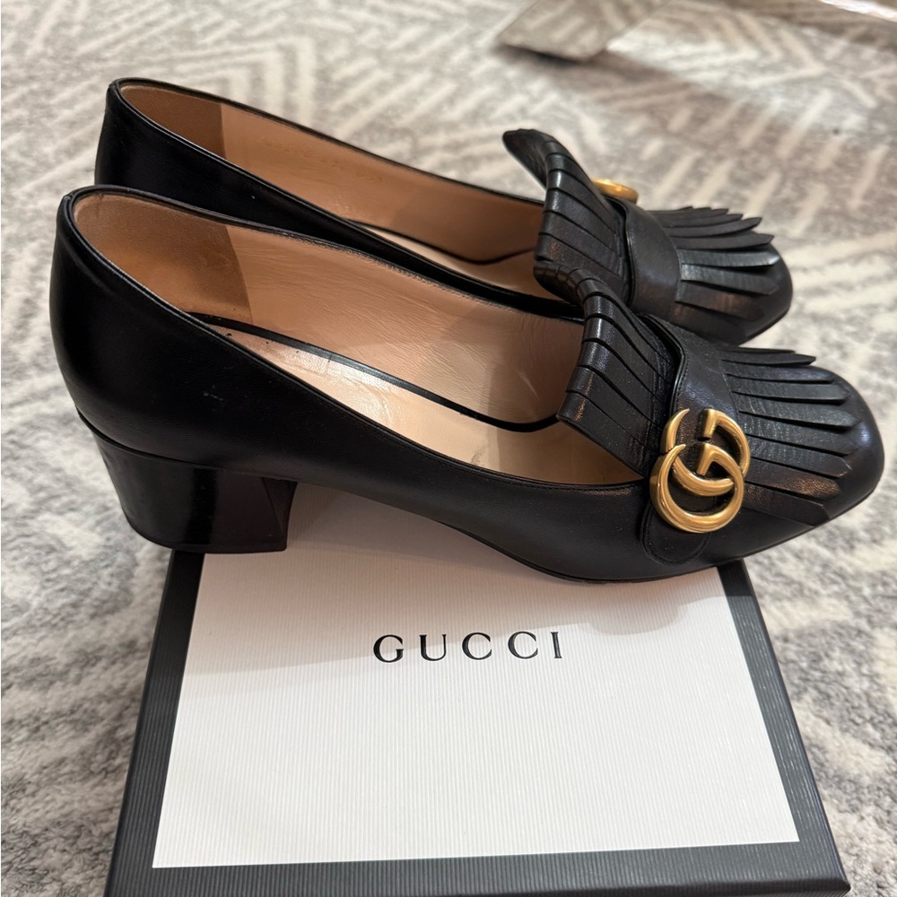 Gucci Black Leather Fringe Loafers with Gold Detail